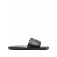 nanushka sandales en cuir à logo embossé - noir